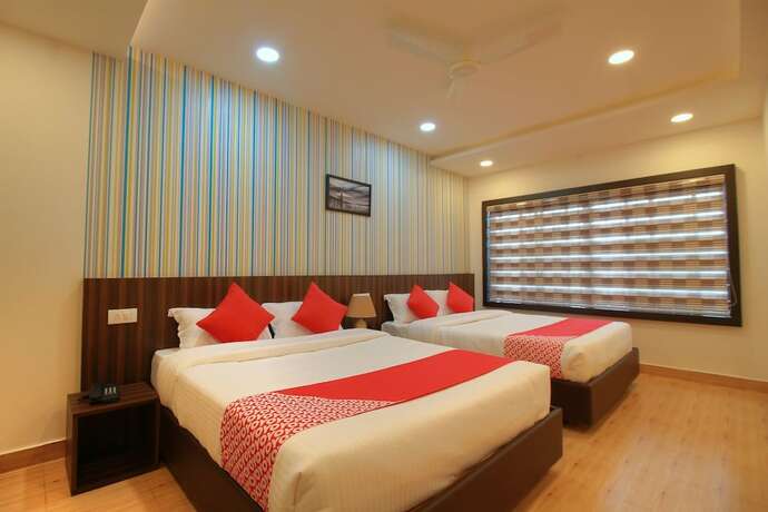 Imagen de la habitación del Hotel Capital O 16047 Igloo Residency. Foto 2