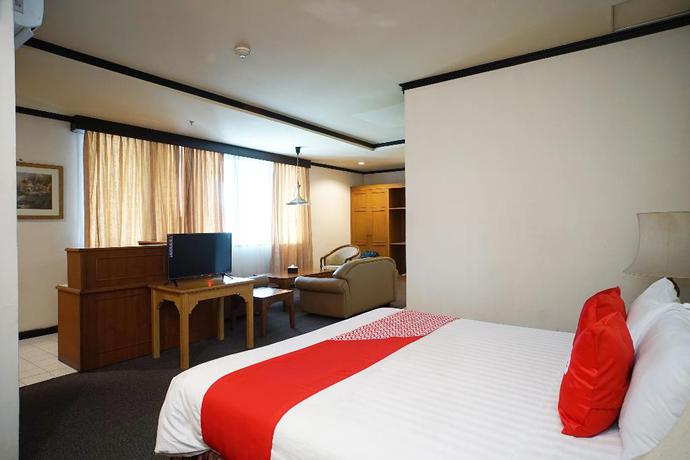 Imagen de la habitación del Hotel Capital O 1735 Adika Bahtera Hotel. Foto 12
