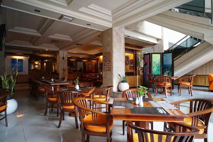 Imagen del bar/restaurante del Hotel Capital O 1735 Adika Bahtera Hotel. Foto 4