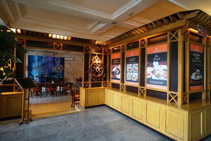 Imagen del bar/restaurante del Hotel Capital O 1735 Adika Bahtera Hotel. Foto 5