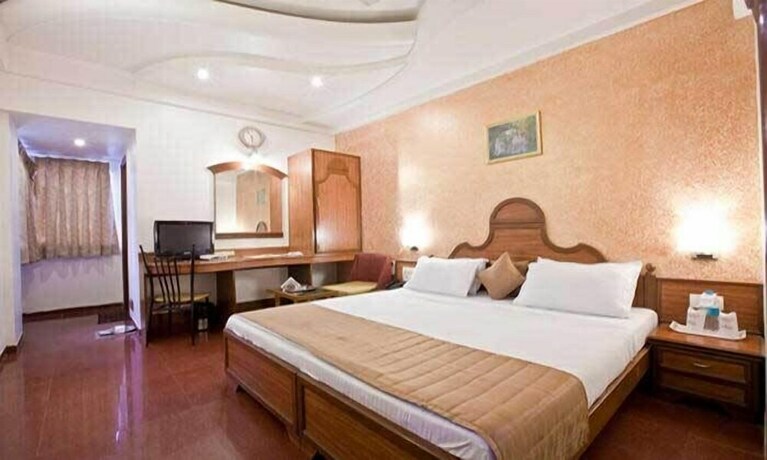 Imagen de la habitación del Hotel Capital O 18973 Summit. Foto 14