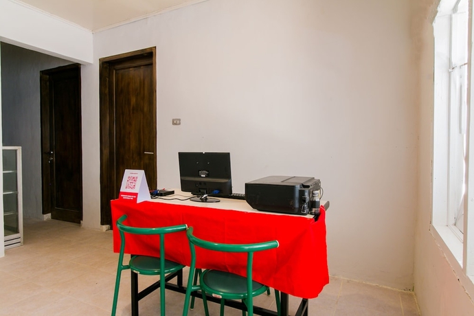 Imagen de los interiores del Hotel Capital O 1898 Louise Place. Foto 17