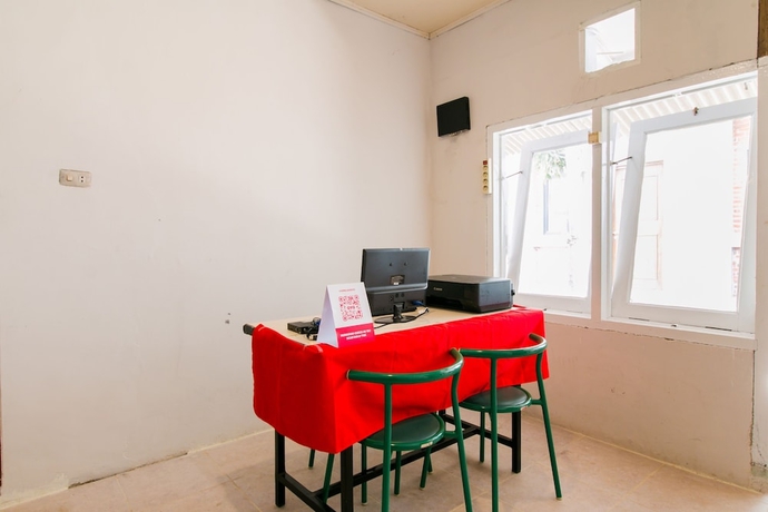 Imagen de los interiores del Hotel Capital O 1898 Louise Place. Foto 19