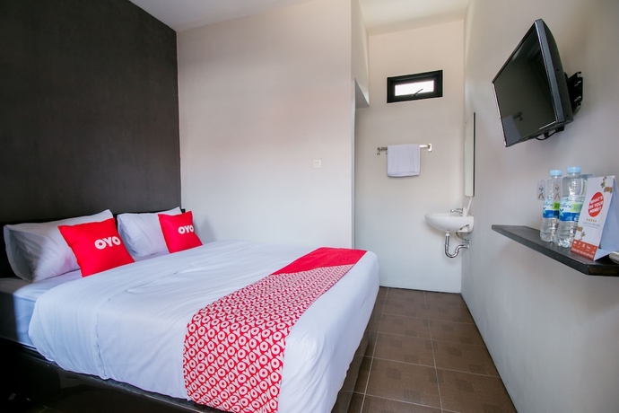 Imagen de la habitación del Hotel Capital O 1898 Louise Place. Foto 9