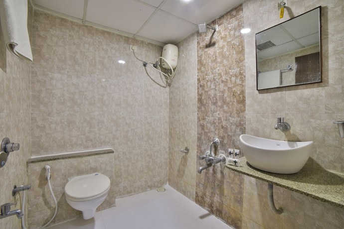 Imagen de la habitación del Hotel Capital O 1967 Kalash Residency. Foto 11