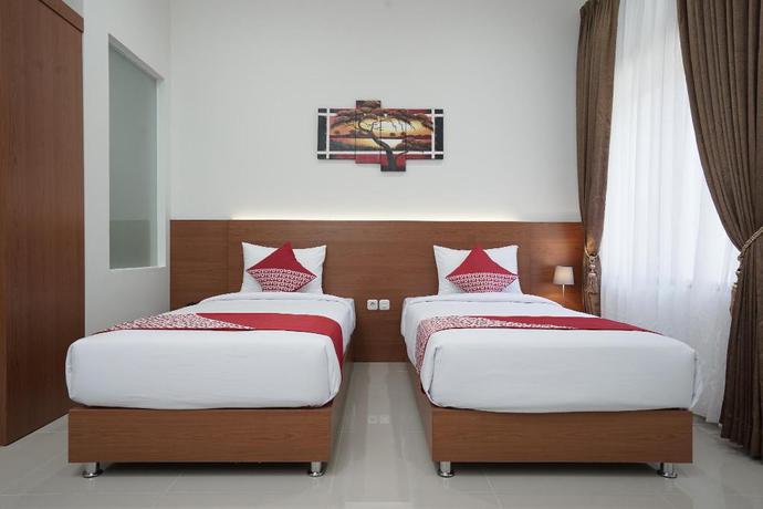 Imagen de la habitación del Hotel Capital O 1974 Grand Parigi Hotel. Foto 3