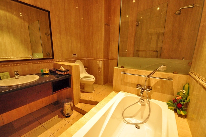 Imagen de la habitación del Hotel Capital O 2114 Grand Jimbaran Boutique. Foto 4
