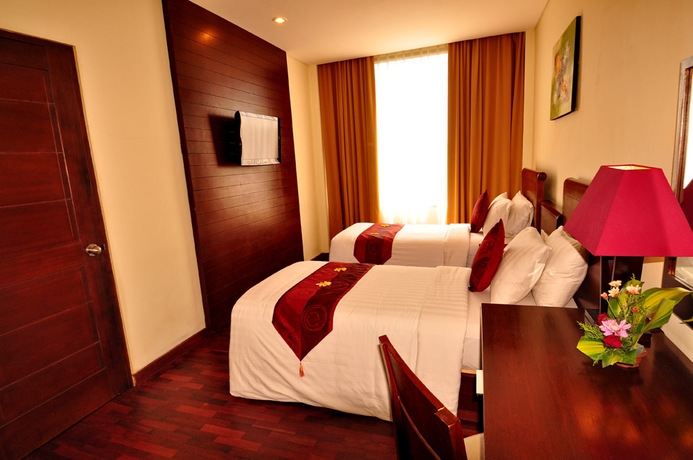 Imagen de la habitación del Hotel Capital O 2114 Grand Jimbaran Boutique. Foto 5