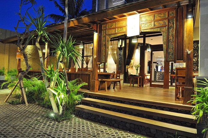 Imagen del bar/restaurante del Hotel Capital O 2114 Grand Jimbaran Boutique. Foto 3