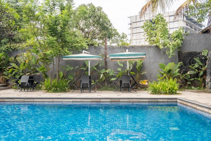 Imagen de la piscina del Hotel Capital O 2239 Hotel Endah Parahyangan. Foto 19