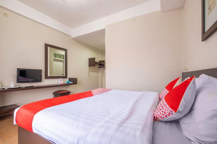 Imagen de la habitación del Hotel Capital O 2239 Hotel Endah Parahyangan. Foto 1