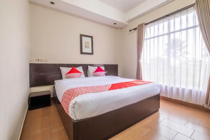 Imagen de la habitación del Hotel Capital O 2239 Hotel Endah Parahyangan. Foto 4