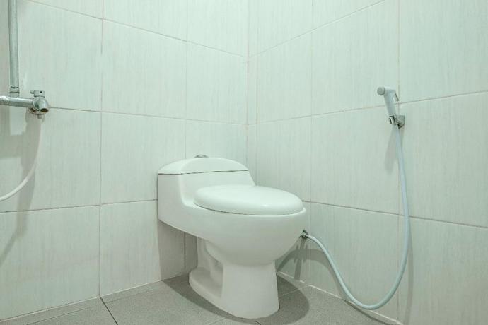 Imagen de la habitación del Hotel Capital O 2239 Hotel Endah Parahyangan. Foto 7