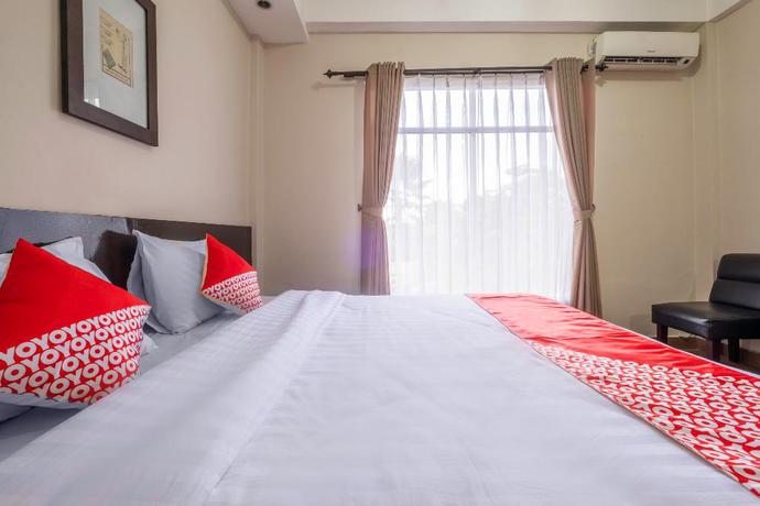Imagen de la habitación del Hotel Capital O 2239 Hotel Endah Parahyangan. Foto 9