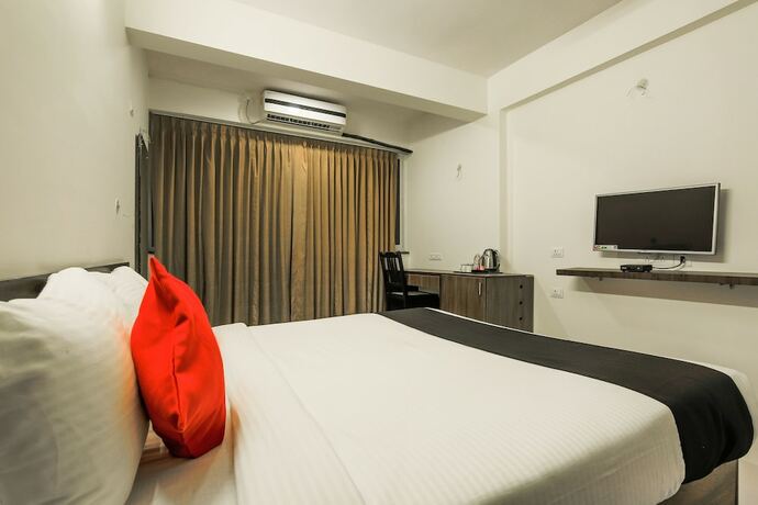 Imagen de la habitación del Hotel Capital O 23094 Mint Porvorim Suites. Foto 9