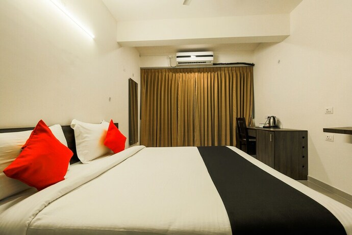 Imagen de la habitación del Hotel Capital O 23094 Mint Porvorim Suites. Foto 11