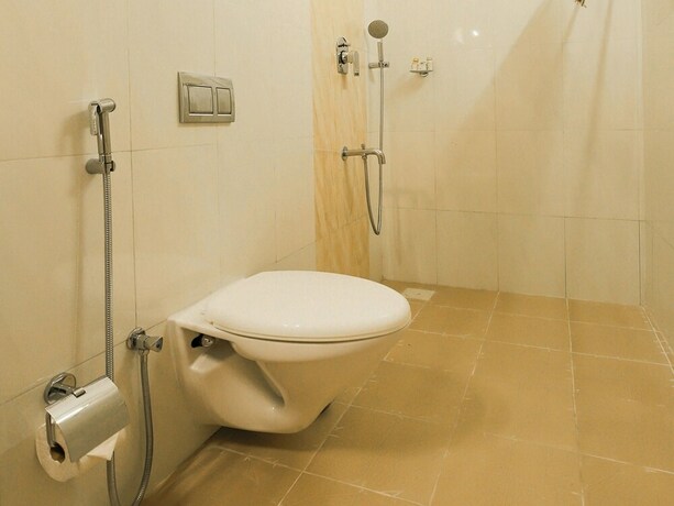 Imagen de la habitación del Hotel Capital O 23094 Mint Porvorim Suites. Foto 14