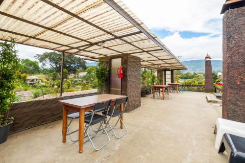 Imagen general del Hotel Capital O 2640 Cottage GS Rumah Kayu Syariah. Foto 1