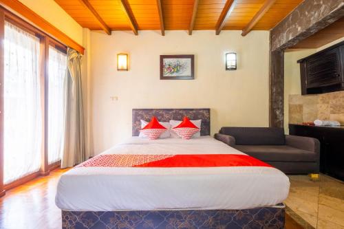 Imagen de la habitación del Hotel Capital O 2640 Cottage GS Rumah Kayu Syariah. Foto 19