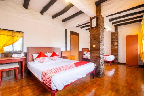 Imagen de la habitación del Hotel Capital O 2640 Cottage GS Rumah Kayu Syariah. Foto 20