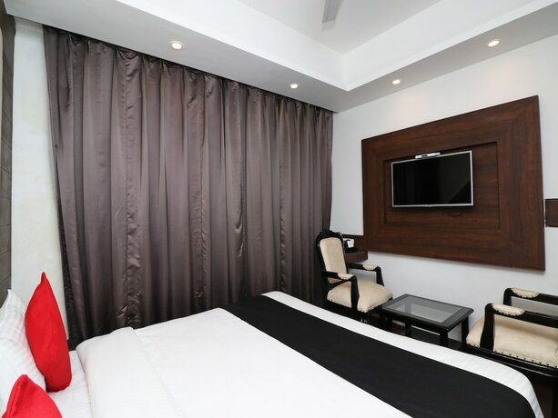 Imagen de la habitación del Hotel Capital O 26634 Grand Sm Regency. Foto 18