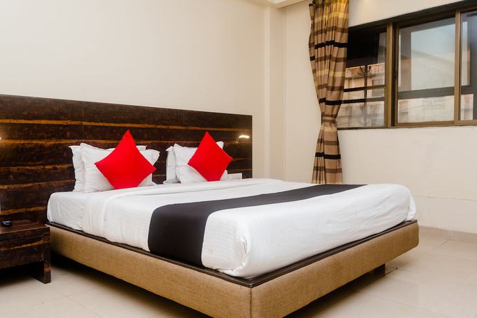 Imagen de la habitación del Hotel Capital O 27600 Sai Plaza. Foto 3