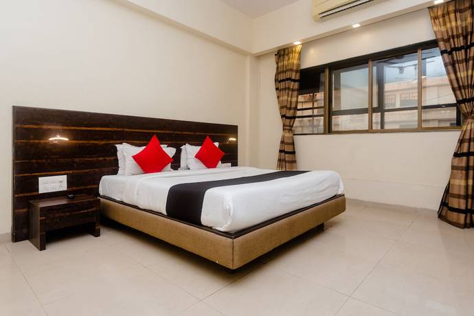 Imagen de la habitación del Hotel Capital O 27600 Sai Plaza. Foto 4