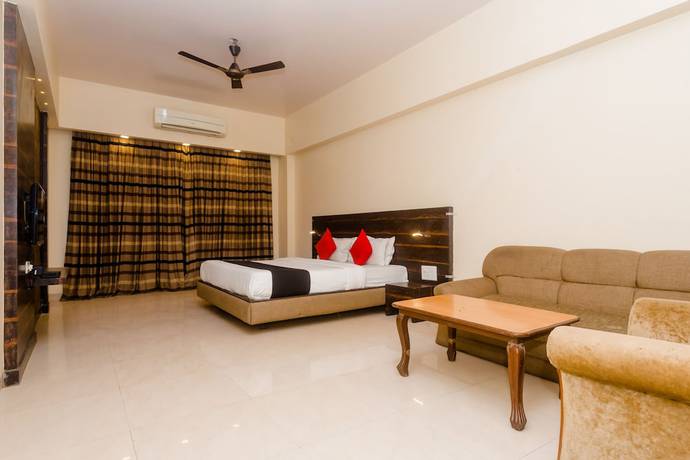 Imagen de la habitación del Hotel Capital O 27600 Sai Plaza. Foto 10