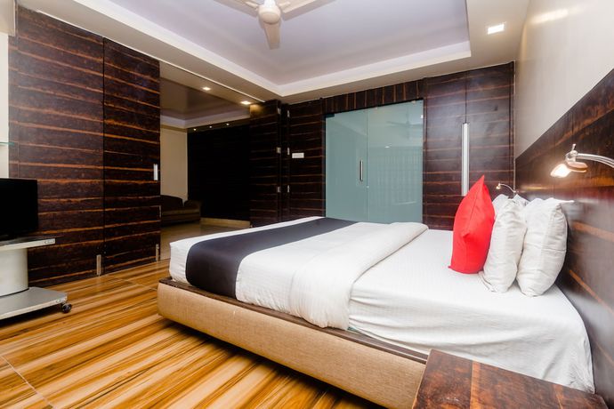 Imagen de la habitación del Hotel Capital O 27600 Sai Plaza. Foto 13