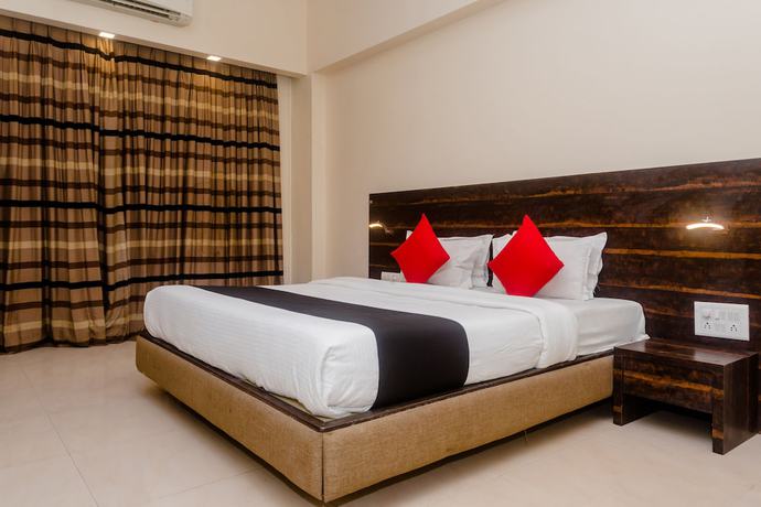 Imagen de la habitación del Hotel Capital O 27600 Sai Plaza. Foto 15