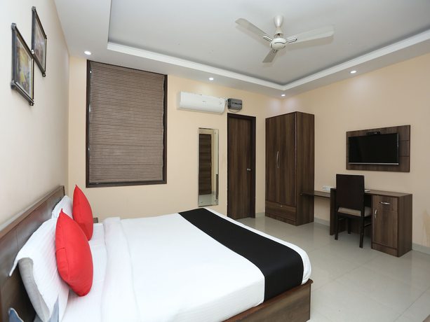 Imagen de la habitación del Hotel Capital O 2852 Bilberry. Foto 5