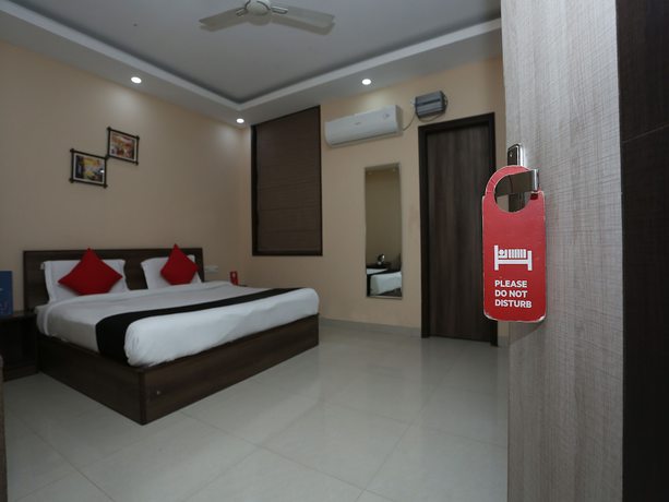 Imagen de la habitación del Hotel Capital O 2852 Bilberry. Foto 6