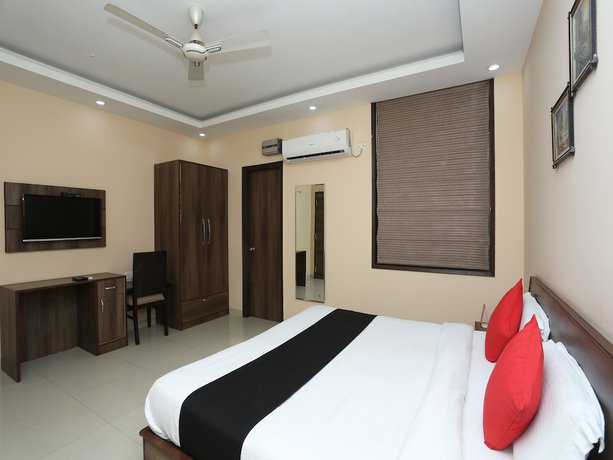 Imagen de la habitación del Hotel Capital O 2852 Bilberry. Foto 8