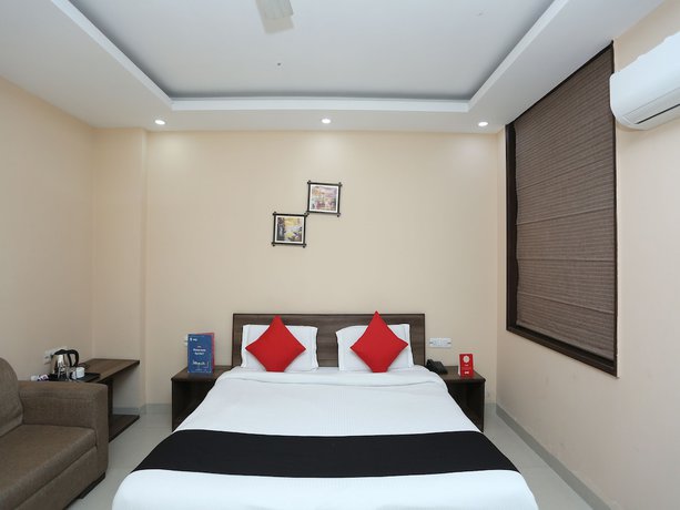 Imagen de la habitación del Hotel Capital O 2852 Bilberry. Foto 11