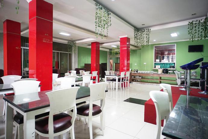 Imagen del bar/restaurante del Hotel Capital O 2885 Hemra. Foto 5