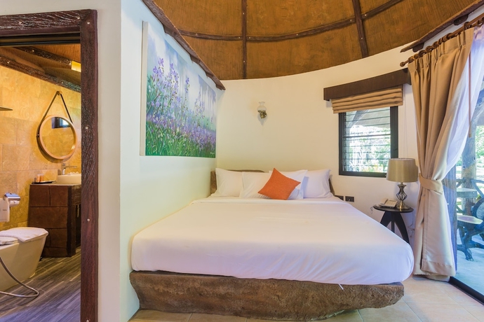 Imagen de la habitación del Hotel Capital O 370 Nernkhao Resort. Foto 3