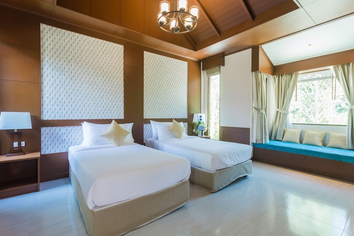 Imagen de la habitación del Hotel Capital O 370 Nernkhao Resort. Foto 6