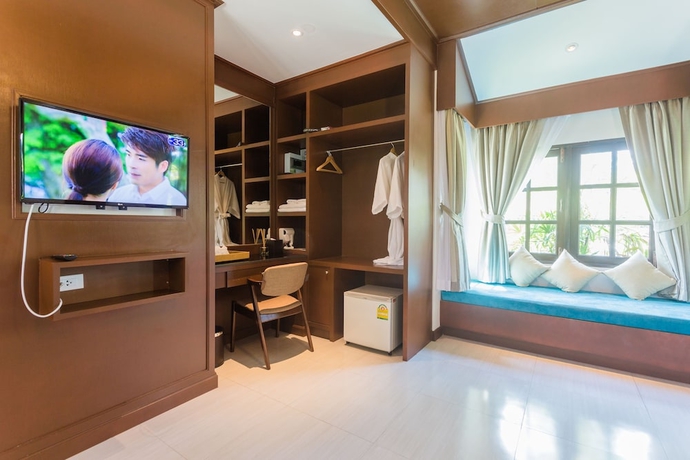 Imagen de la habitación del Hotel Capital O 370 Nernkhao Resort. Foto 9