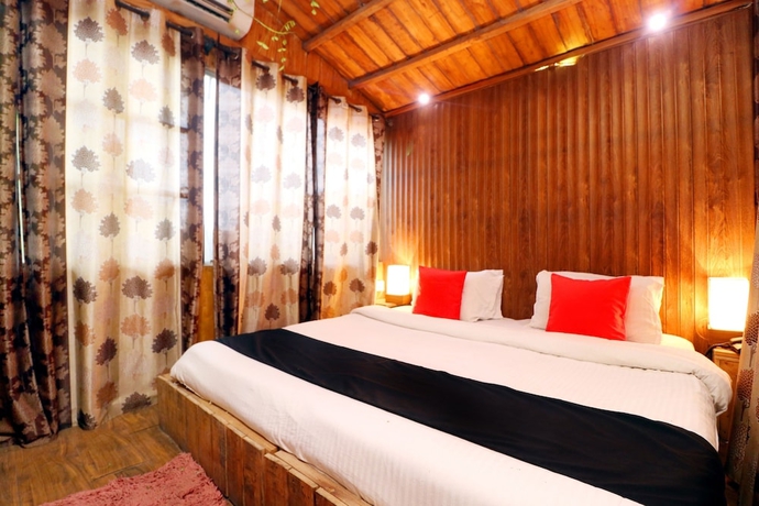 Imagen de la habitación del Hotel Capital O 3864 Master Farm. Foto 3