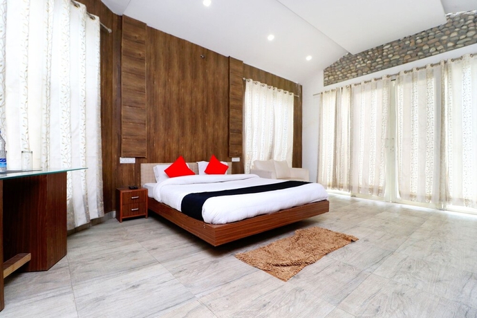 Imagen de la habitación del Hotel Capital O 3864 Master Farm. Foto 4