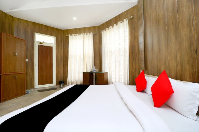 Imagen de la habitación del Hotel Capital O 3864 Master Farm. Foto 5