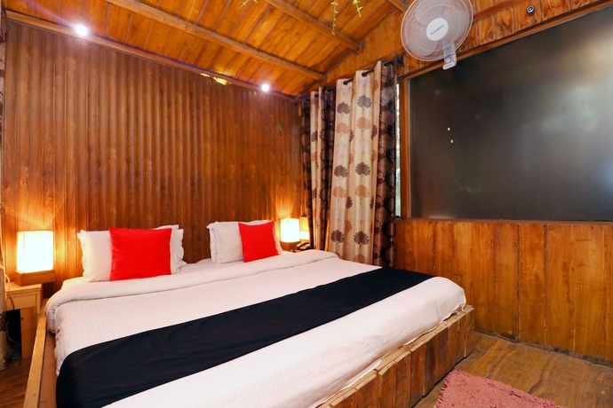 Imagen de la habitación del Hotel Capital O 3864 Master Farm. Foto 7