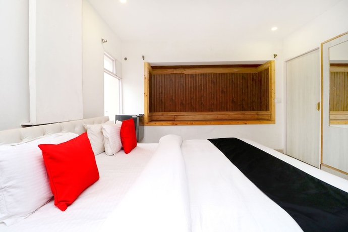 Imagen de la habitación del Hotel Capital O 3864 Master Farm. Foto 9