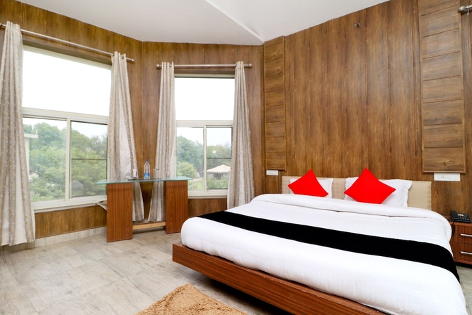 Imagen de la habitación del Hotel Capital O 3864 Master Farm. Foto 10