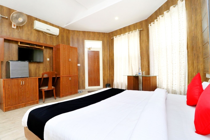 Imagen de la habitación del Hotel Capital O 3864 Master Farm. Foto 12