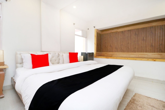 Imagen de la habitación del Hotel Capital O 3864 Master Farm. Foto 15