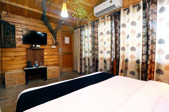 Imagen de la habitación del Hotel Capital O 3864 Master Farm. Foto 16