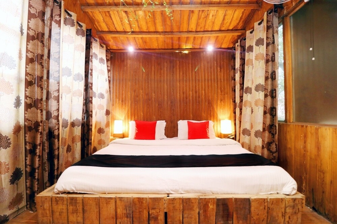 Imagen de la habitación del Hotel Capital O 3864 Master Farm. Foto 17