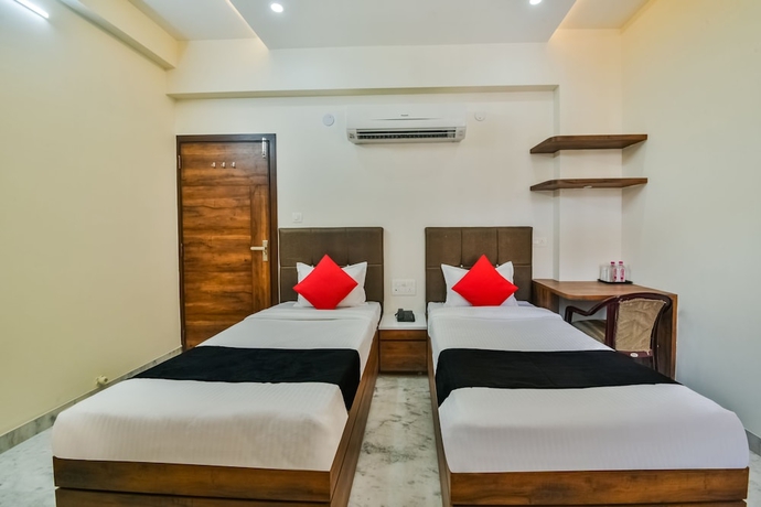 Imagen de la habitación del Hotel Capital O 40000 The Sejour. Foto 6