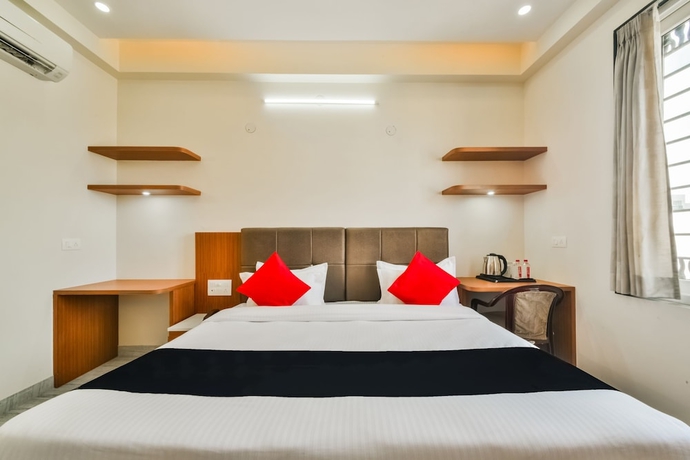 Imagen de la habitación del Hotel Capital O 40000 The Sejour. Foto 10